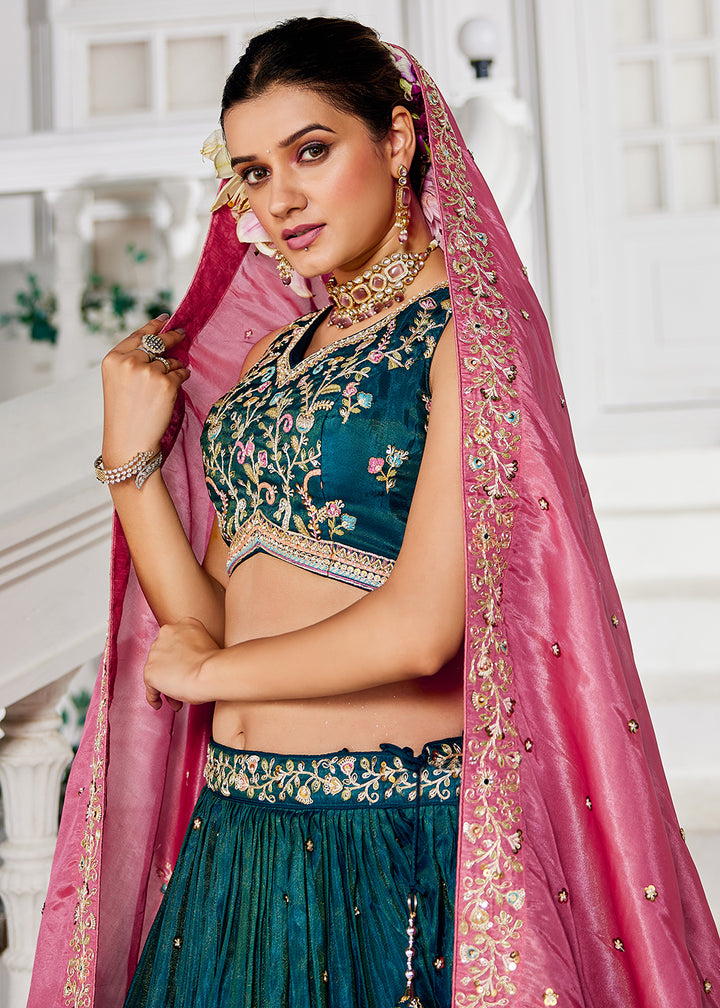 Buy Now Teal Satin Sequins Embroidered Sangeet Lehenga Choli Online in USA, UK, Canada, France, Italy, Germany, Australia, UAE & Worldwide at Empress Clothing.