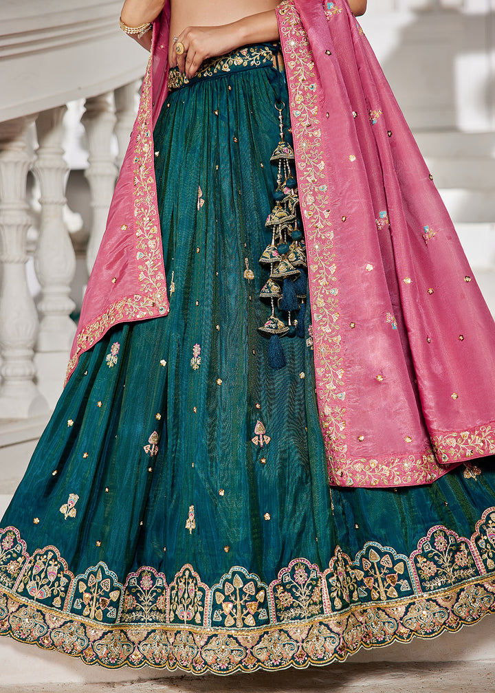 Buy Now Teal Satin Sequins Embroidered Sangeet Lehenga Choli Online in USA, UK, Canada, France, Italy, Germany, Australia, UAE & Worldwide at Empress Clothing.