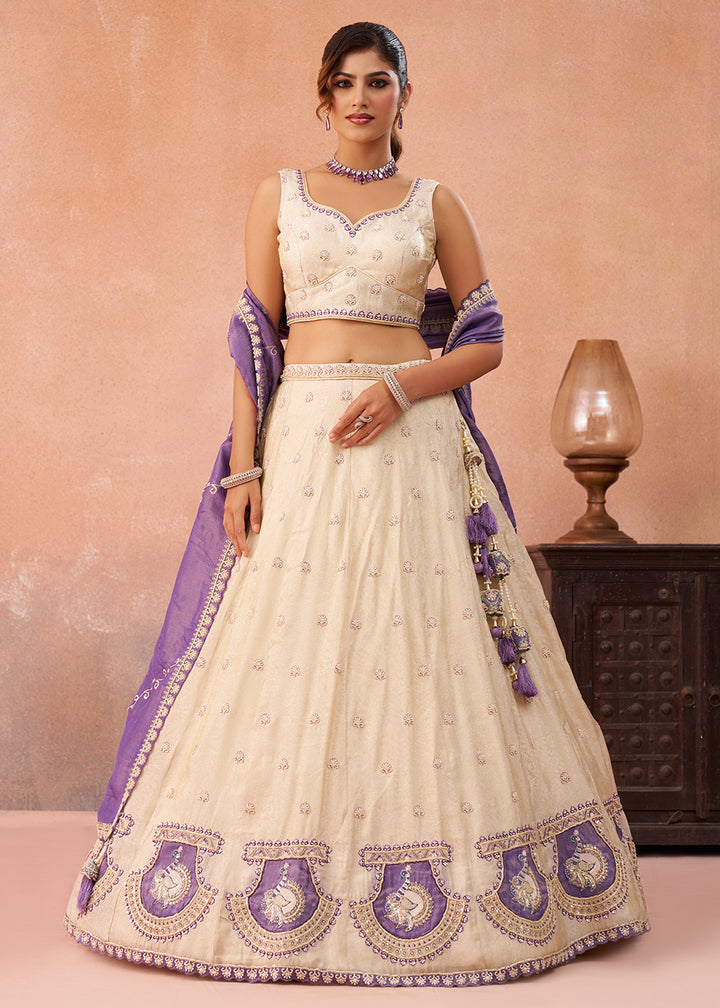 Buy Now Cream Jacquard with Peacock Patch Work Lehenga Choli Online in US, UK, Canada, France, Italy, Germany, Sweden, Denmark, UAE & Worldwide at Empress.