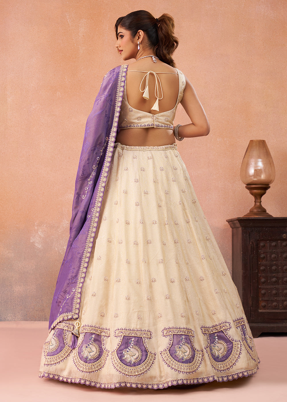 Buy Now Cream Jacquard with Peacock Patch Work Lehenga Choli Online in US, UK, Canada, France, Italy, Germany, Sweden, Denmark, UAE & Worldwide at Empress.