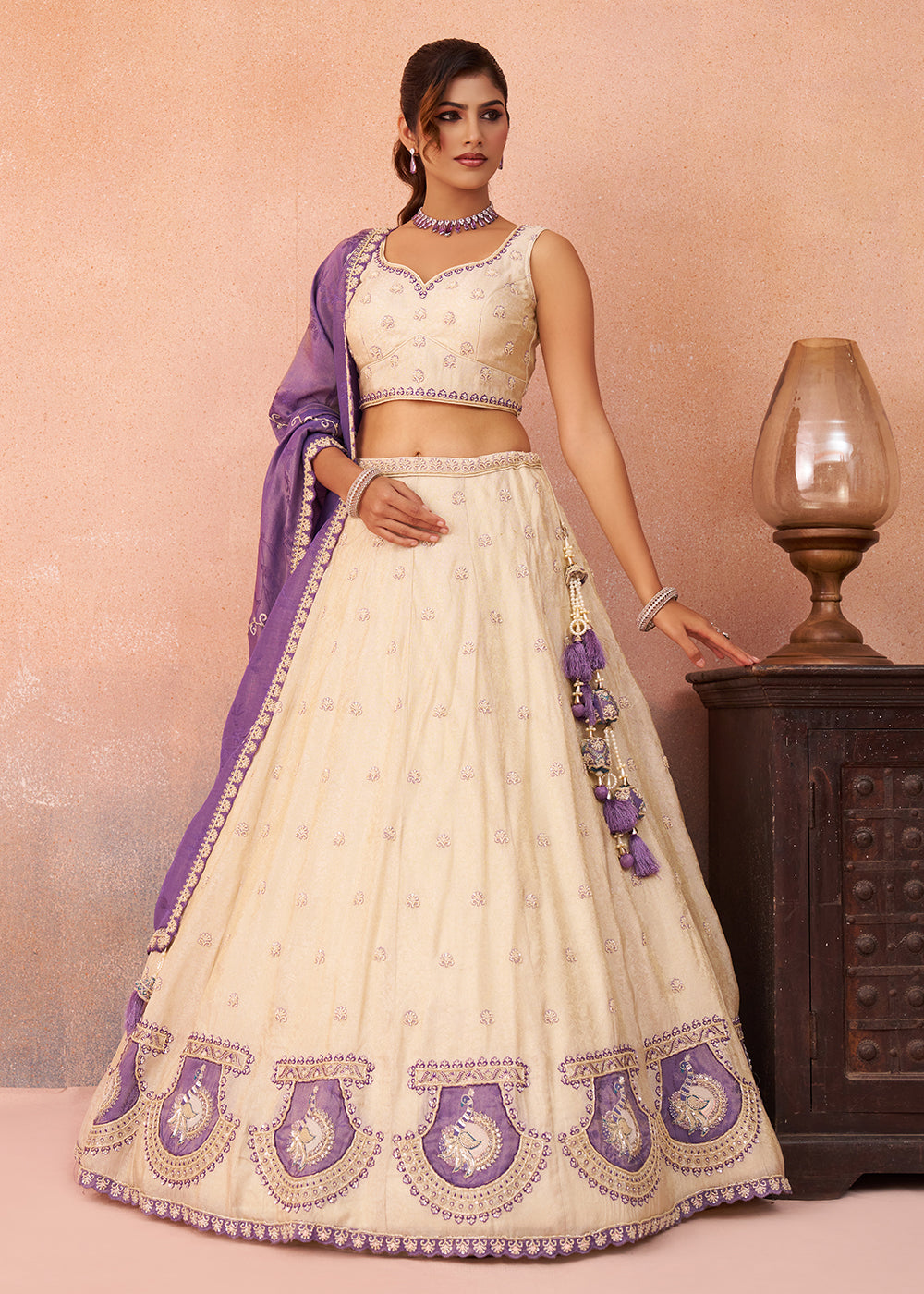 Buy Now Cream Jacquard with Peacock Patch Work Lehenga Choli Online in US, UK, Canada, France, Italy, Germany, Sweden, Denmark, UAE & Worldwide at Empress.