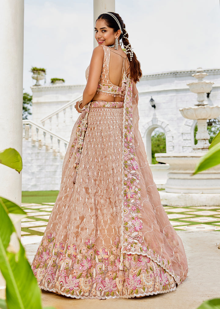 Buy Now Nude Pink Satin Silk Sequins & Cording Wedding Lehenga Choli Online in US, UK, Canada, France, Italy, Germany, Austria, Denmark & Worldwide at Empress.