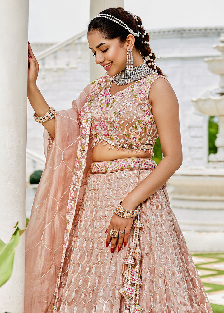Buy Now Nude Pink Satin Silk Sequins & Cording Wedding Lehenga Choli Online in US, UK, Canada, France, Italy, Germany, Austria, Denmark & Worldwide at Empress.