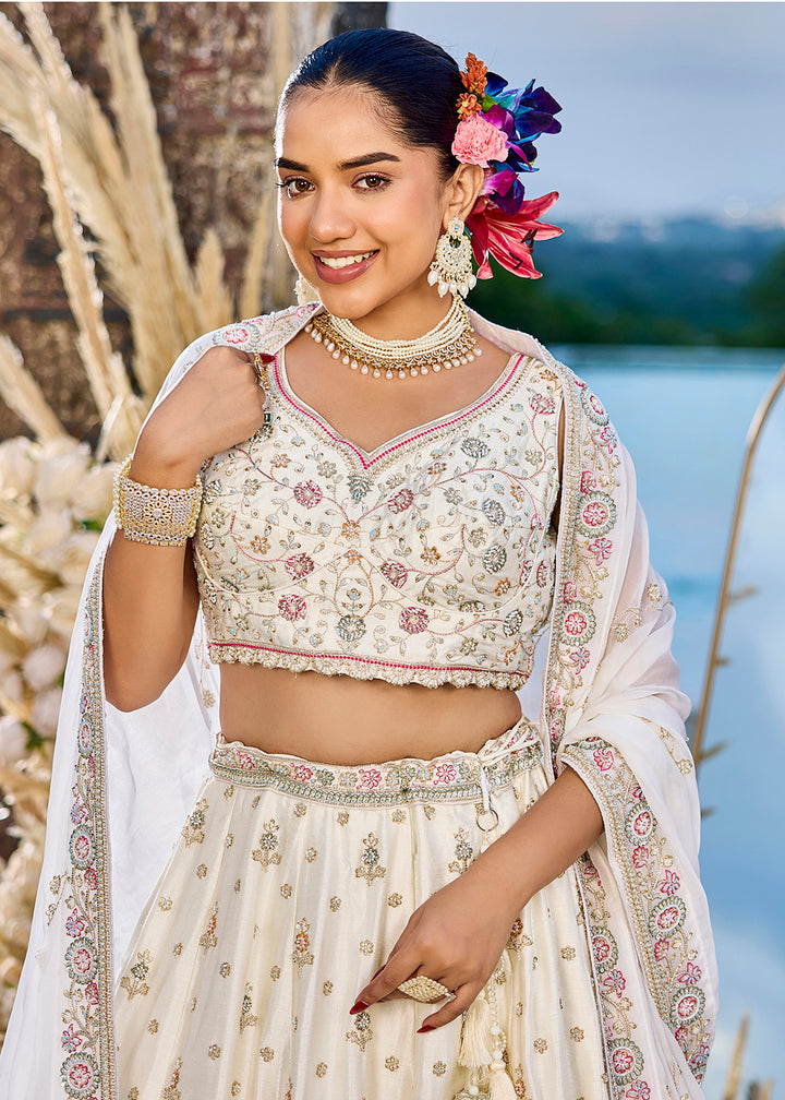 Buy Now Silk Fabric Cream Color Wedding Wear Lehenga Choli Online in US, UK, Canada, France, Italy, Germany, Sweden, Greece, Denmark & Worldwide at Empress.