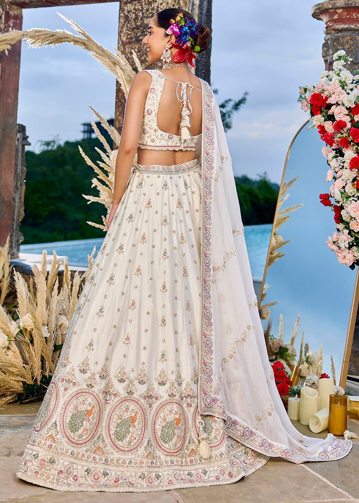 Buy Now Silk Fabric Cream Color Wedding Wear Lehenga Choli Online in US, UK, Canada, France, Italy, Germany, Sweden, Greece, Denmark & Worldwide at Empress.