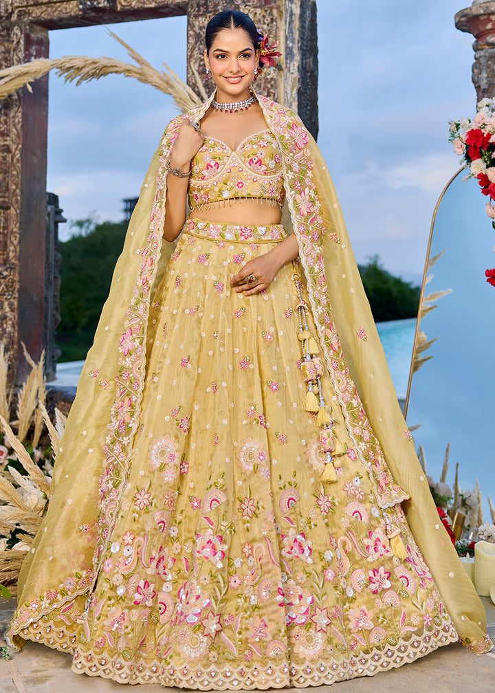 Buy Now Yellow Organza Beads & Sequins Wedding Lehenga Choli Online in US, UK, Canada, France, Italy, Germany, Austria, Denmark, Spain & Worldwide at Empress.
