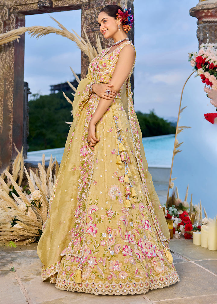 Buy Now Yellow Organza Beads & Sequins Wedding Lehenga Choli Online in US, UK, Canada, France, Italy, Germany, Austria, Denmark, Spain & Worldwide at Empress.