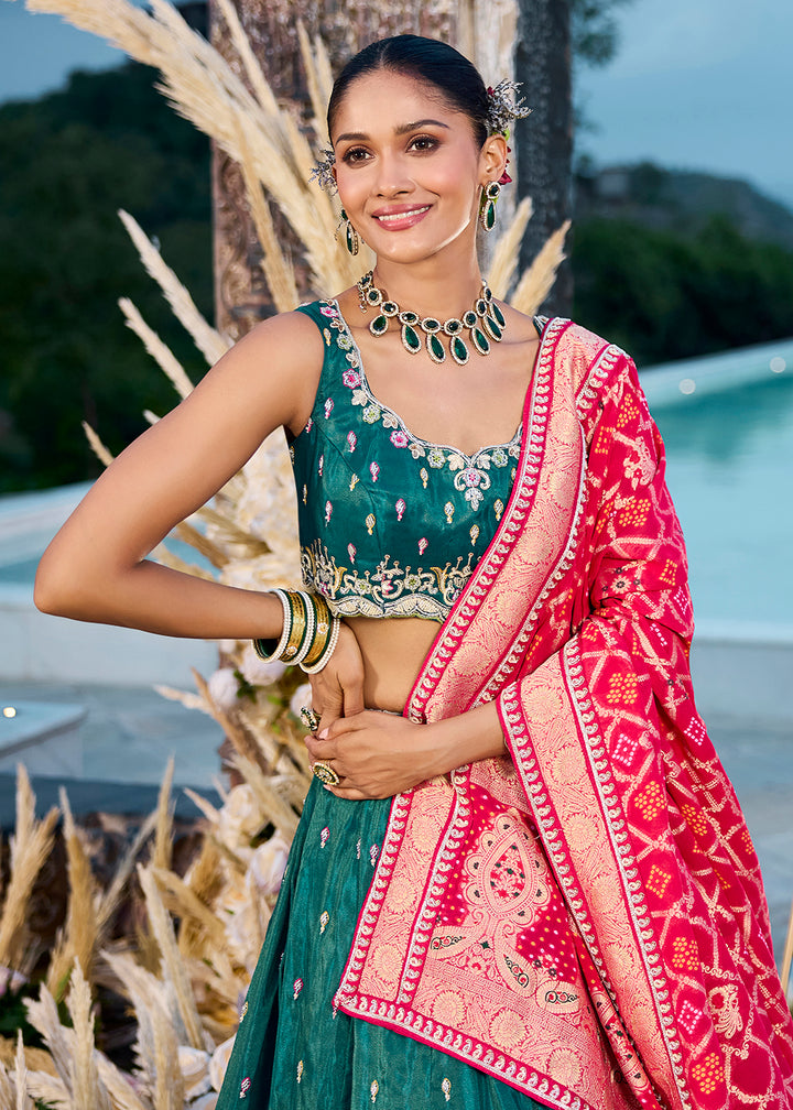 Buy Now Green Cosmos Silk Embroidered Wedding Lehenga Choli Online in US, UK, Canada, France, Italy, Germany, Sweden, Denmark, Greece & Worldwide at Empress.