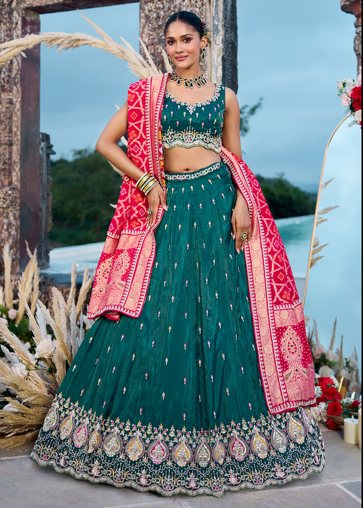 Buy Now Green Cosmos Silk Embroidered Wedding Lehenga Choli Online in US, UK, Canada, France, Italy, Germany, Sweden, Denmark, Greece & Worldwide at Empress.