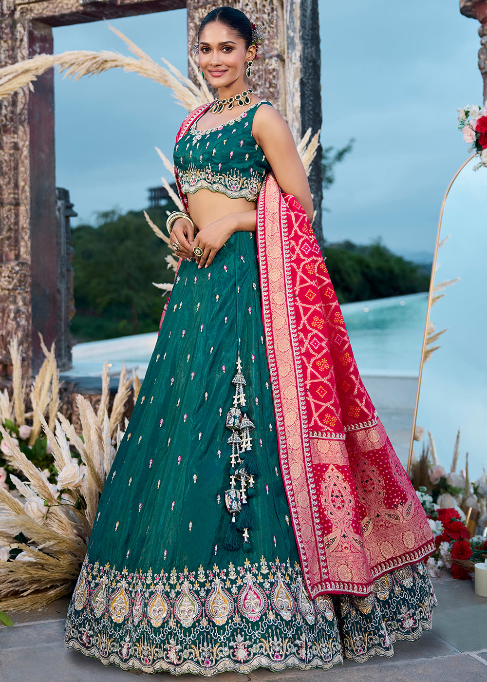 Buy Now Green Cosmos Silk Embroidered Wedding Lehenga Choli Online in US, UK, Canada, France, Italy, Germany, Sweden, Denmark, Greece & Worldwide at Empress.