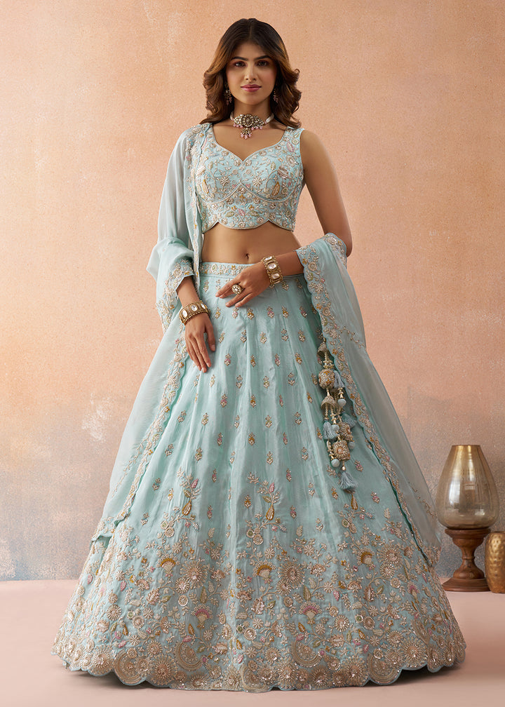 Buy Now Sky Blue Beads & Sequins Wedding Lehenga Choli Online in US, UK, Canada, France, Italy, Germany, Sweden, Denmark, UAE, Greece & Worldwide at Empress.