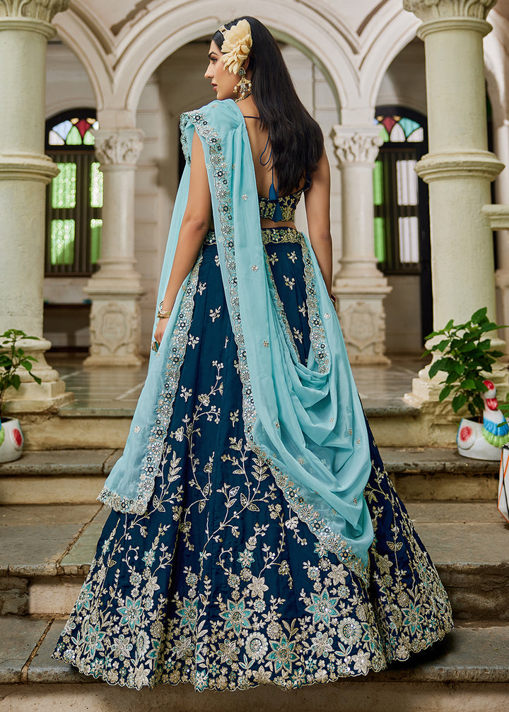 Buy Now Trendy Blue Embroidered Organza Wedding Lehenga Choli Online in USA, UK, Canada, France, Italy, Germany, Austria, UAE & Worldwide at Empress Clothing.