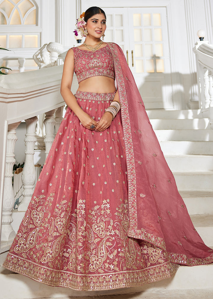 Buy Now Golden Tissue Pink Sequins Reception Lehenga Choli Online in USA, UK, Canada, France, Italy, Germany, Austria, UAE & Worldwide at Empress Clothing.