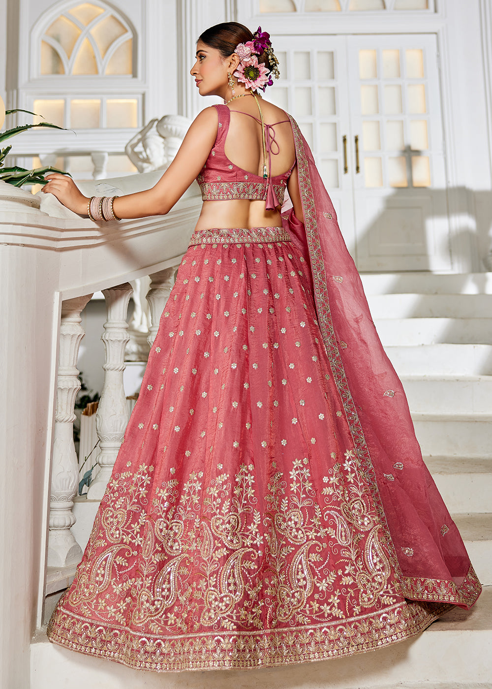 Buy Now Golden Tissue Pink Sequins Reception Lehenga Choli Online in USA, UK, Canada, France, Italy, Germany, Austria, UAE & Worldwide at Empress Clothing.