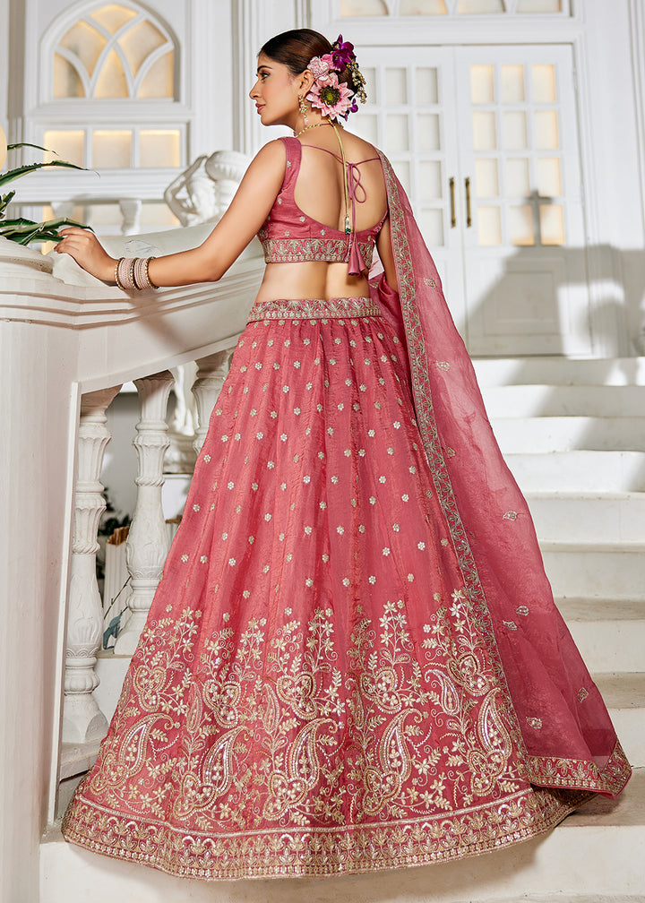 Buy Now Golden Tissue Pink Sequins Reception Lehenga Choli Online in USA, UK, Canada, France, Italy, Germany, Austria, UAE & Worldwide at Empress Clothing.