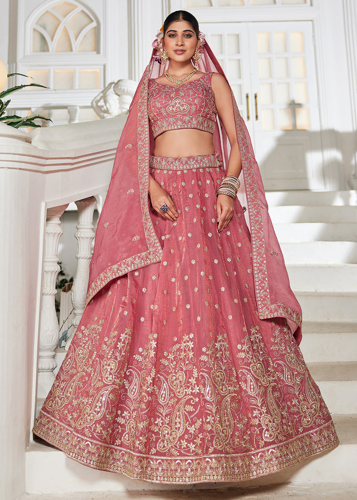 Buy Now Golden Tissue Pink Sequins Reception Lehenga Choli Online in USA, UK, Canada, France, Italy, Germany, Austria, UAE & Worldwide at Empress Clothing.