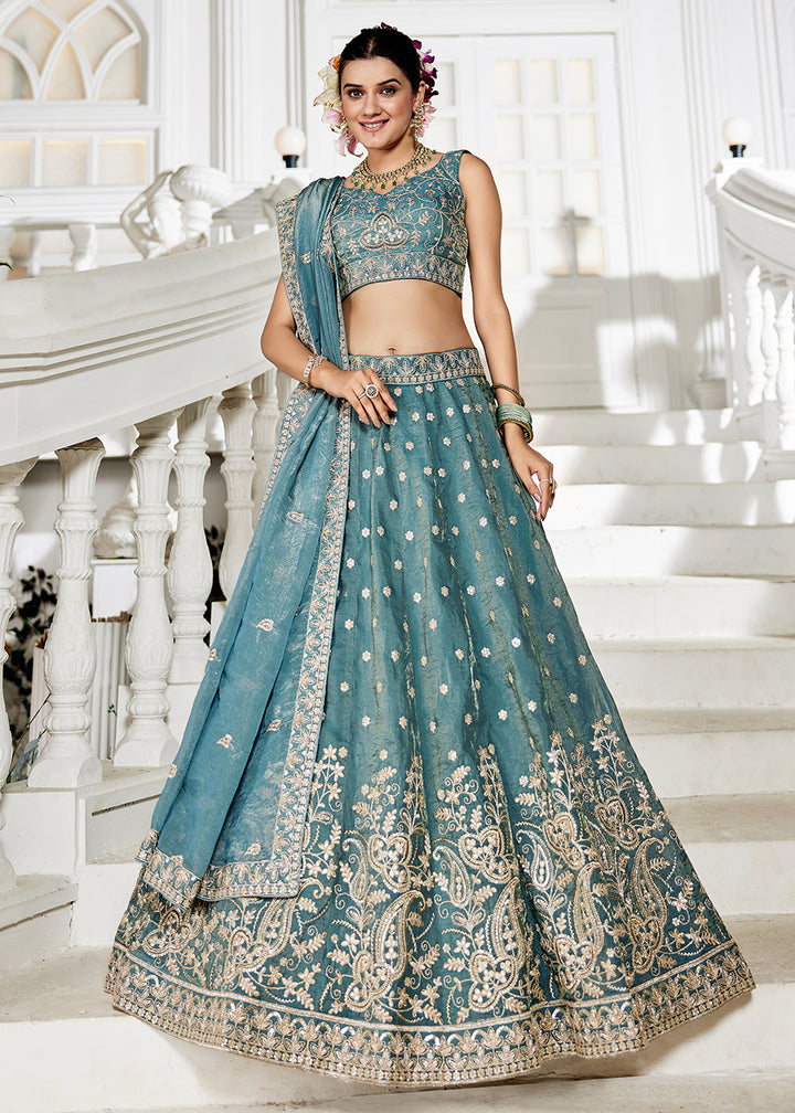 Buy Now Golden Tissue Green Sequins Reception Lehenga Choli Online in USA, UK, Canada, France, Italy, Germany, Austria, UAE & Worldwide at Empress Clothing.