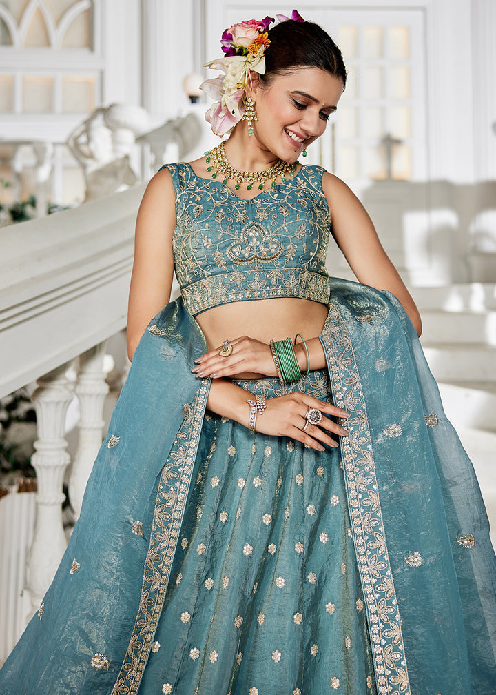 Buy Now Golden Tissue Green Sequins Reception Lehenga Choli Online in USA, UK, Canada, France, Italy, Germany, Austria, UAE & Worldwide at Empress Clothing.