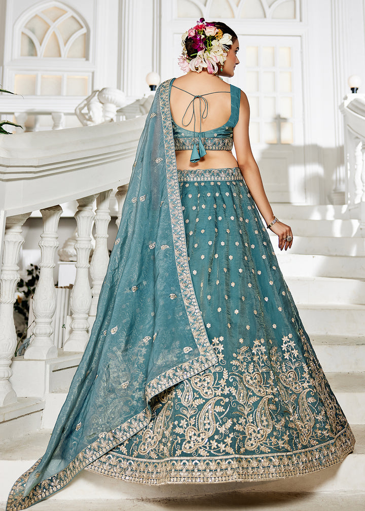 Buy Now Golden Tissue Green Sequins Reception Lehenga Choli Online in USA, UK, Canada, France, Italy, Germany, Austria, UAE & Worldwide at Empress Clothing.