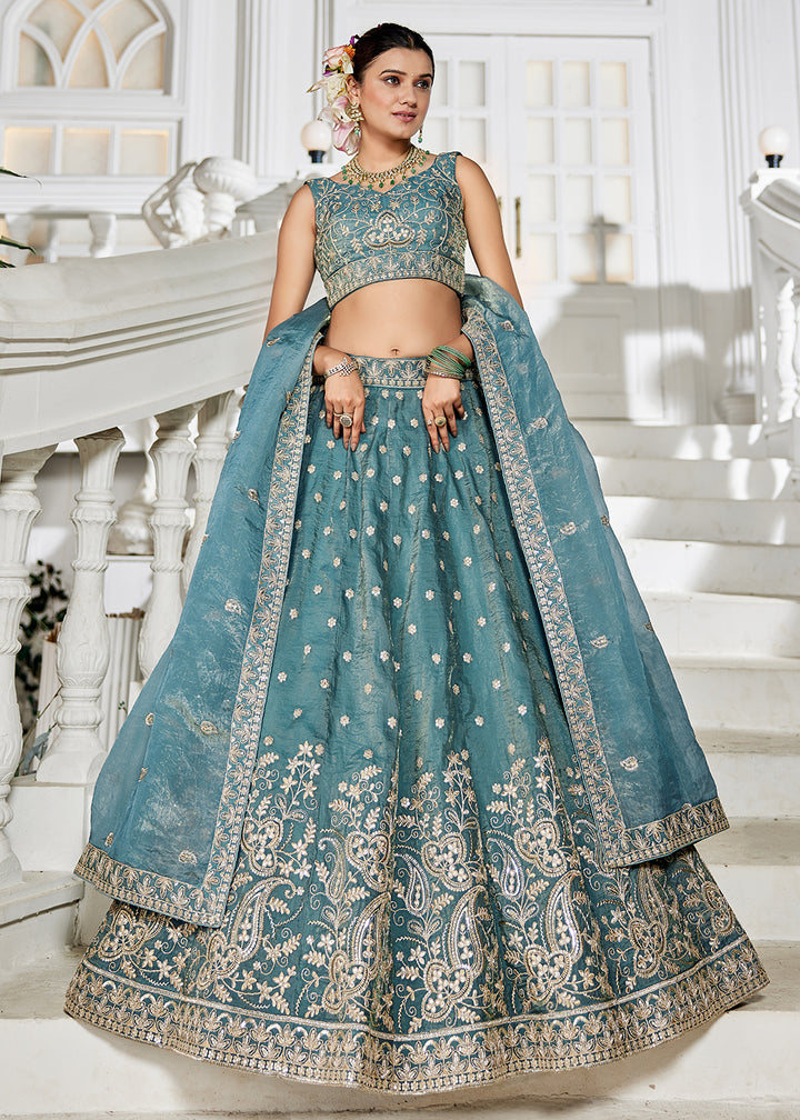 Buy Now Golden Tissue Green Sequins Reception Lehenga Choli Online in USA, UK, Canada, France, Italy, Germany, Austria, UAE & Worldwide at Empress Clothing.