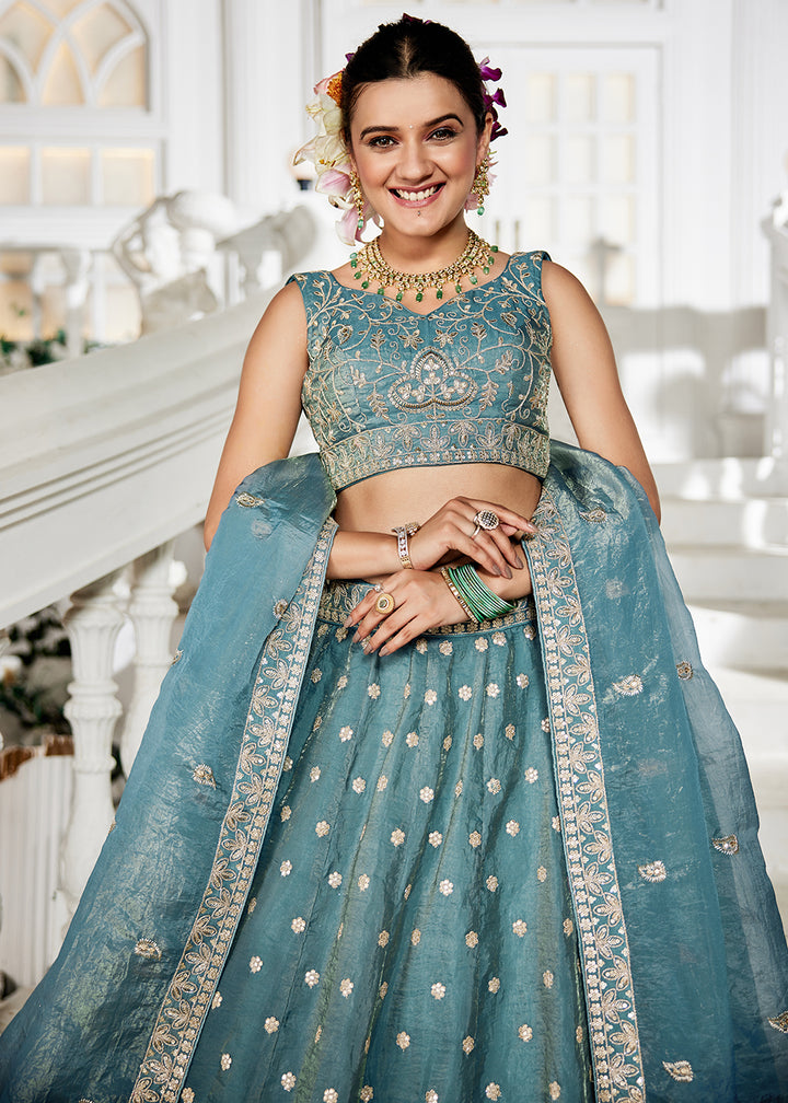 Buy Now Golden Tissue Green Sequins Reception Lehenga Choli Online in USA, UK, Canada, France, Italy, Germany, Austria, UAE & Worldwide at Empress Clothing.