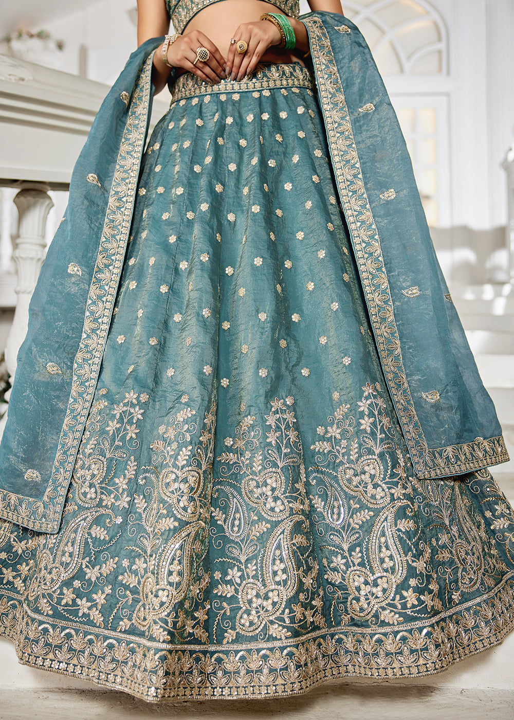 Buy Now Golden Tissue Green Sequins Reception Lehenga Choli Online in USA, UK, Canada, France, Italy, Germany, Austria, UAE & Worldwide at Empress Clothing.