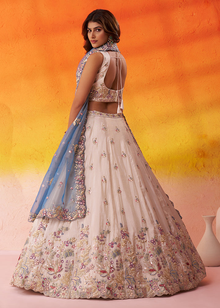 Buy Now Beige Moti Work Designer Lehenga Choli with Blue Dupatta Online in US, UK, Canada, France, Germany, Sweden, Greece, Denmark, UAE & Worldwide at Empress.