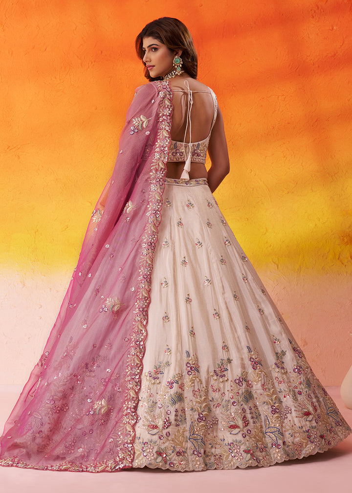 Buy Now Beige Moti Work Designer Lehenga Choli with Pink Dupatta Online in US, UK, Canada, France, Germany, Sweden, Greece, Denmark, UAE & Worldwide at Empress.