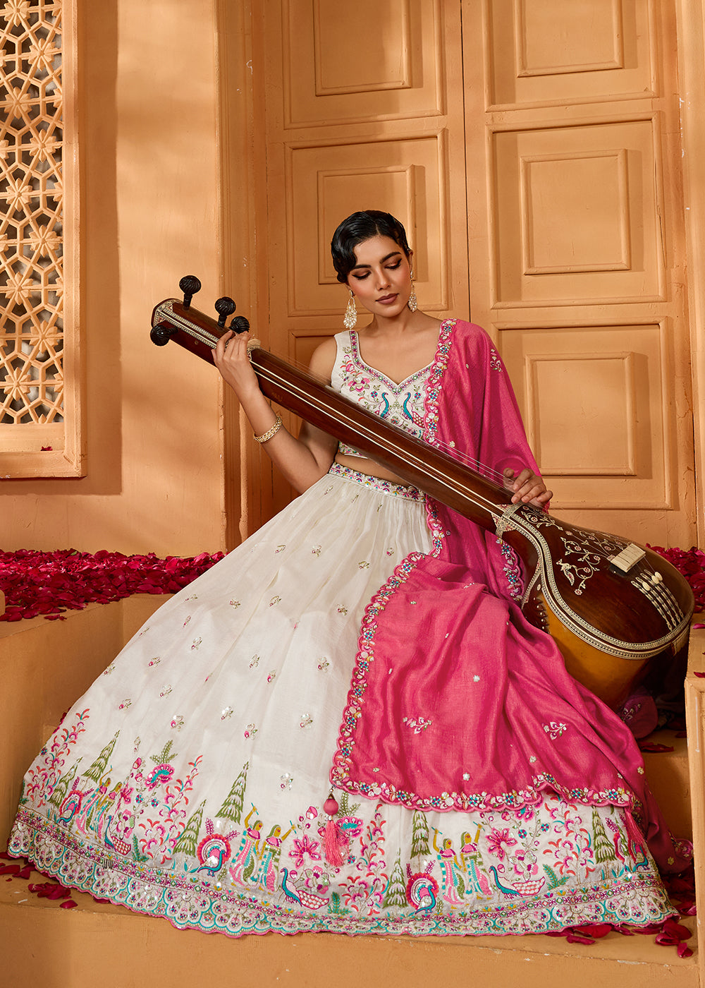 Buy Now Cream Vichitra Silk Embroidered Festive Lehenga Choli Online in US, UK, Canada, France, Italy, Germany, Sweden, Denmark, Greece & Worldwide at Empress.