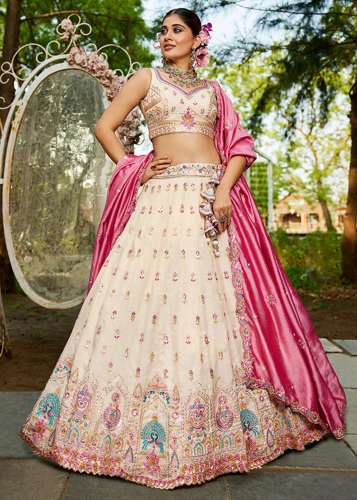 Buy Now Cream Tissue Fabric Embroidered Reception Lehenga Choli Online in USA, UK, Canada, France, Italy, Germany, Denmark, UAE & Worldwide at Empress Clothing.