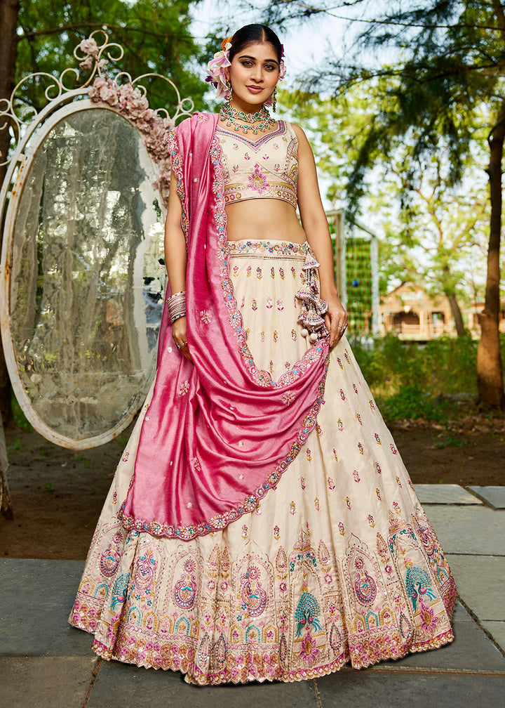 Buy Now Cream Tissue Fabric Embroidered Reception Lehenga Choli Online in USA, UK, Canada, France, Italy, Germany, Denmark, UAE & Worldwide at Empress Clothing.