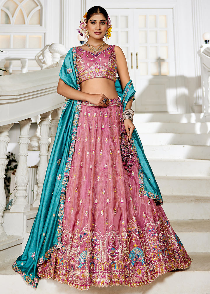 Buy Now Pink Tissue Fabric Embroidered Reception Lehenga Choli Online in USA, UK, Canada, France, Italy, Germany, Denmark, UAE & Worldwide at Empress Clothing.