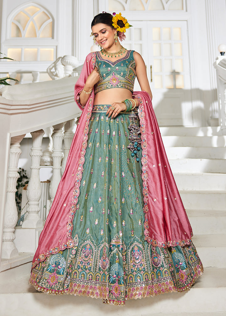 Buy Now Sea Green Tissue Fabric Embroidered Reception Lehenga Choli Online in USA, UK, Canada, France, Italy, Germany, UAE & Worldwide at Empress Clothing.