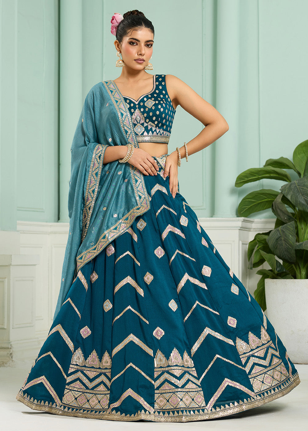 Buy Now Reception Style Teal Blue Embroidered Lehenga Choli Online in US, UK, Canada, France, Italy, Germany, Sweden, Denmark, Greece & Worldwide at Empress.