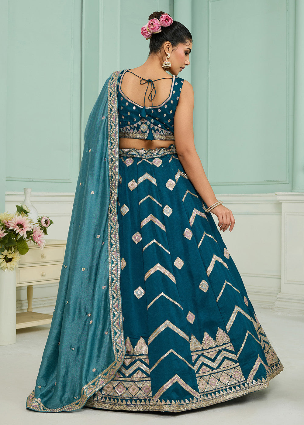Buy Now Reception Style Teal Blue Embroidered Lehenga Choli Online in US, UK, Canada, France, Italy, Germany, Sweden, Denmark, Greece & Worldwide at Empress.