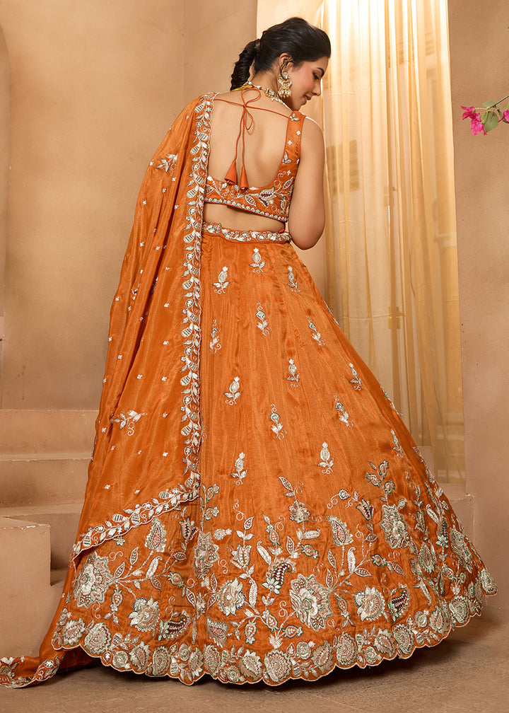 Buy Now Wedding Style Orange Tissue Fabric Lehenga Choli Online in US, UK, Canada, France, Italy, Germany, Sweden, Denmark, Greece, Spain & Worldwide at Empress.