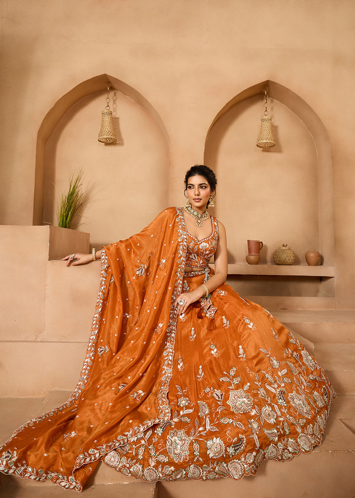 Buy Now Wedding Style Orange Tissue Fabric Lehenga Choli Online in US, UK, Canada, France, Italy, Germany, Sweden, Denmark, Greece, Spain & Worldwide at Empress.