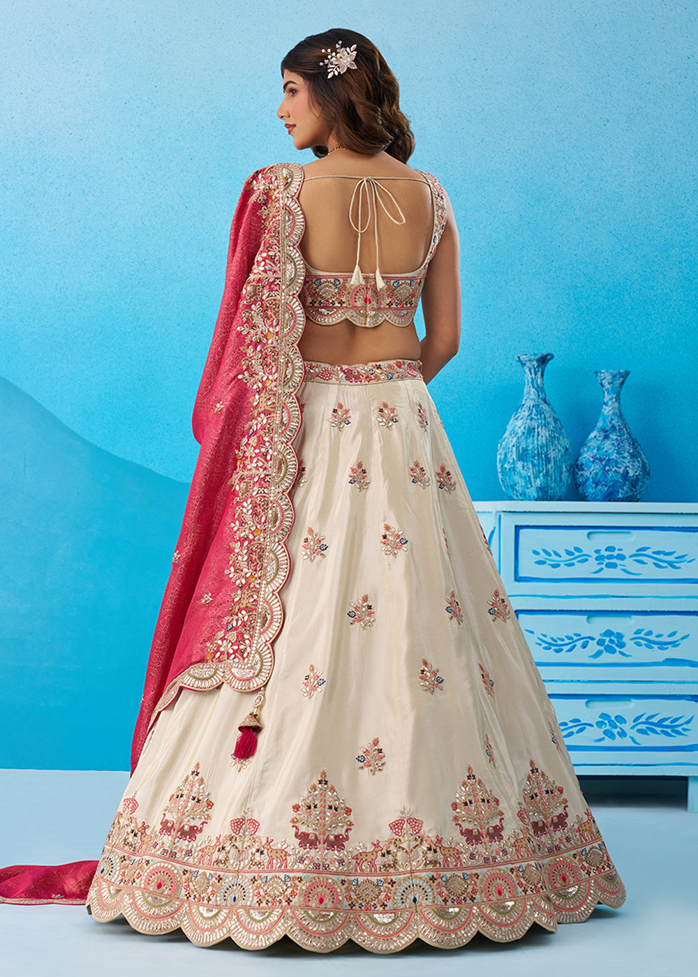 Buy Now Cream Tissue Sequins Embroidered Lehenga Choli with Pink Dupatta Online in US, UK, Canada, France, Italy, Germany, Sweden, UAE & Worldwide at Empress.