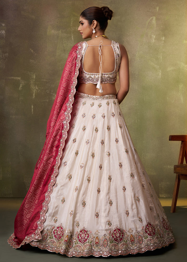 Buy Now Beige Designer Lehenga Choli with Pink Banarasi Silk DupattaOnline in US, UK, Canada, France, Germany, Sweden, Greece, Denmark & Worldwide at Empress.