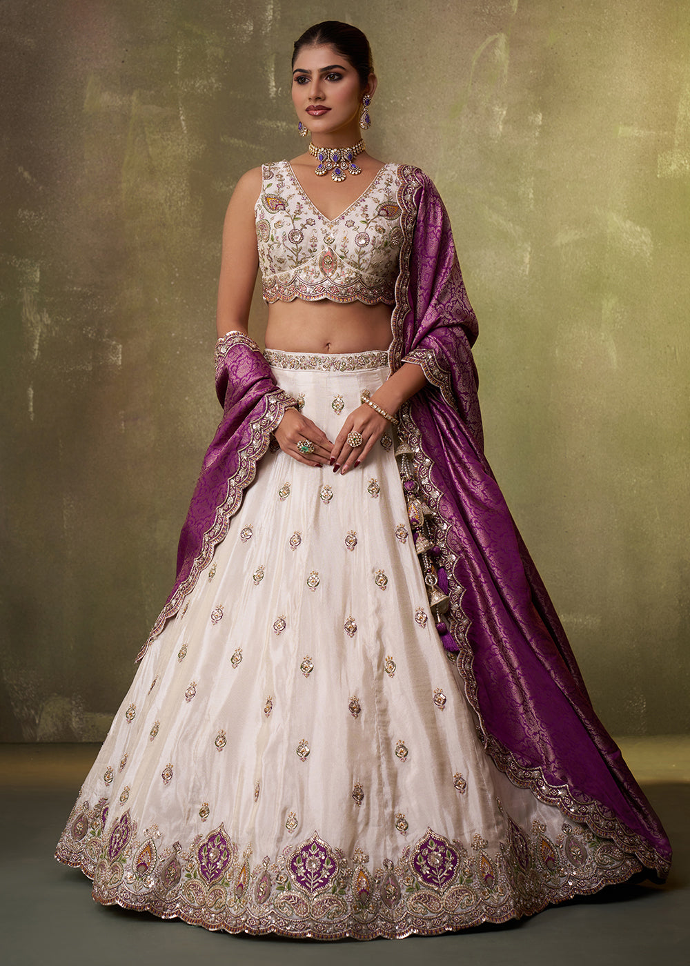Buy Now Beige Designer Lehenga Choli with Purple Banarasi Silk Dupatta Online in US, UK, Canada, France, Germany, Sweden, Greece, Denmark & Worldwide at Empress