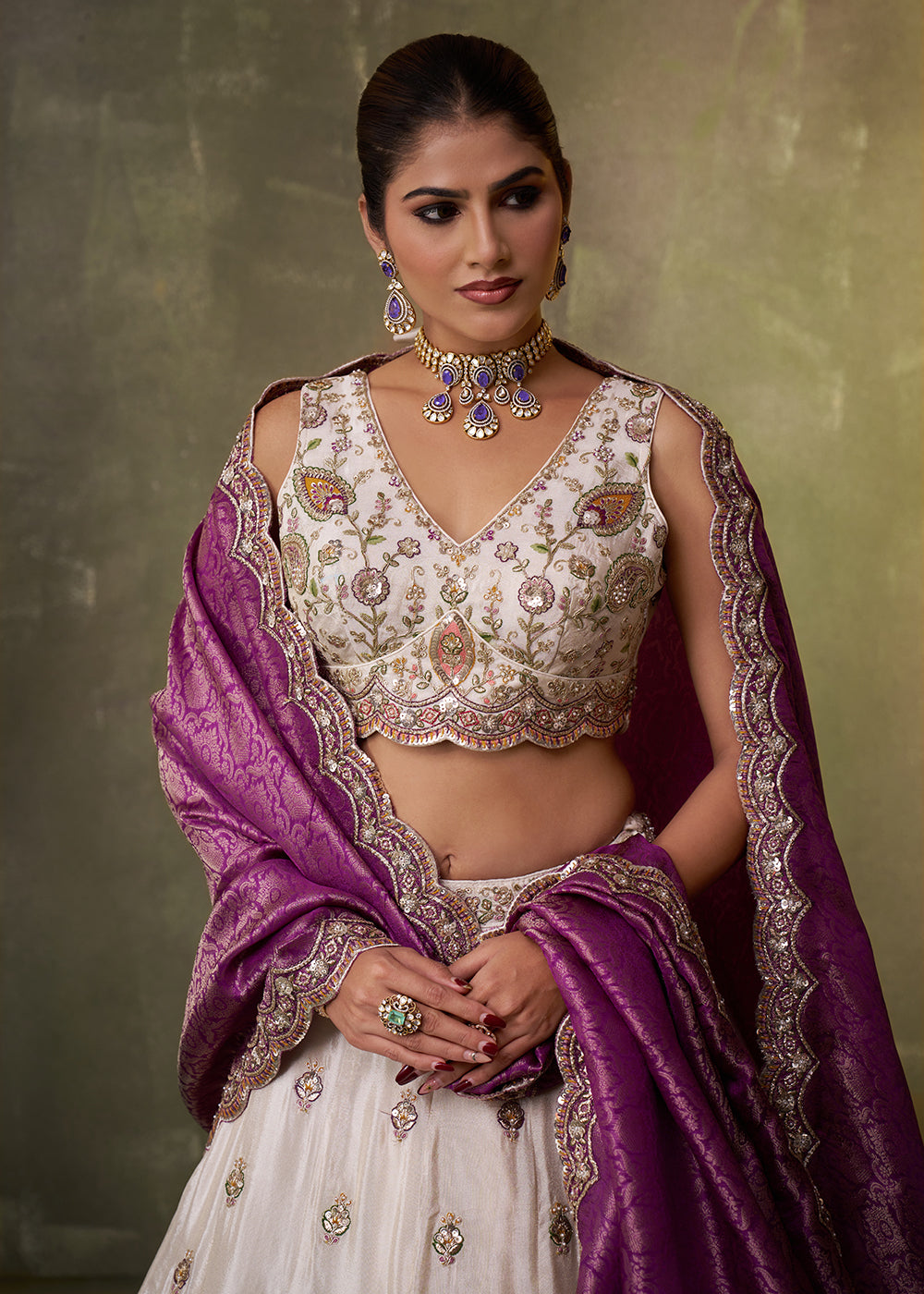 Buy Now Beige Designer Lehenga Choli with Purple Banarasi Silk Dupatta Online in US, UK, Canada, France, Germany, Sweden, Greece, Denmark & Worldwide at Empress
