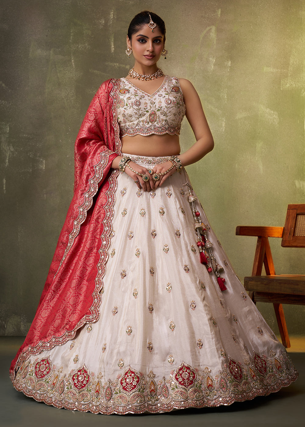 Buy Now Beige Designer Lehenga Choli with Red Banarasi Silk Dupatta Online in US, UK, Canada, France, Germany, Sweden, Greece, Denmark & Worldwide at Empress.