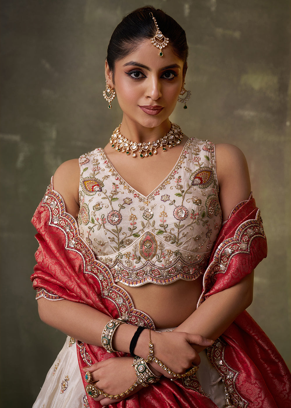 Buy Now Beige Designer Lehenga Choli with Red Banarasi Silk Dupatta Online in US, UK, Canada, France, Germany, Sweden, Greece, Denmark & Worldwide at Empress.
