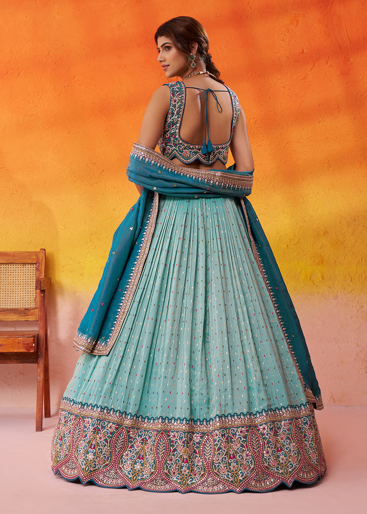 Buy Now Turquoise Blue Jacquard Tissue Wedding Lehenga Choli Online in US, UK, Canada, France, Germany, Sweden, Greece, Denmark, Maldives & Worldwide at Empress.