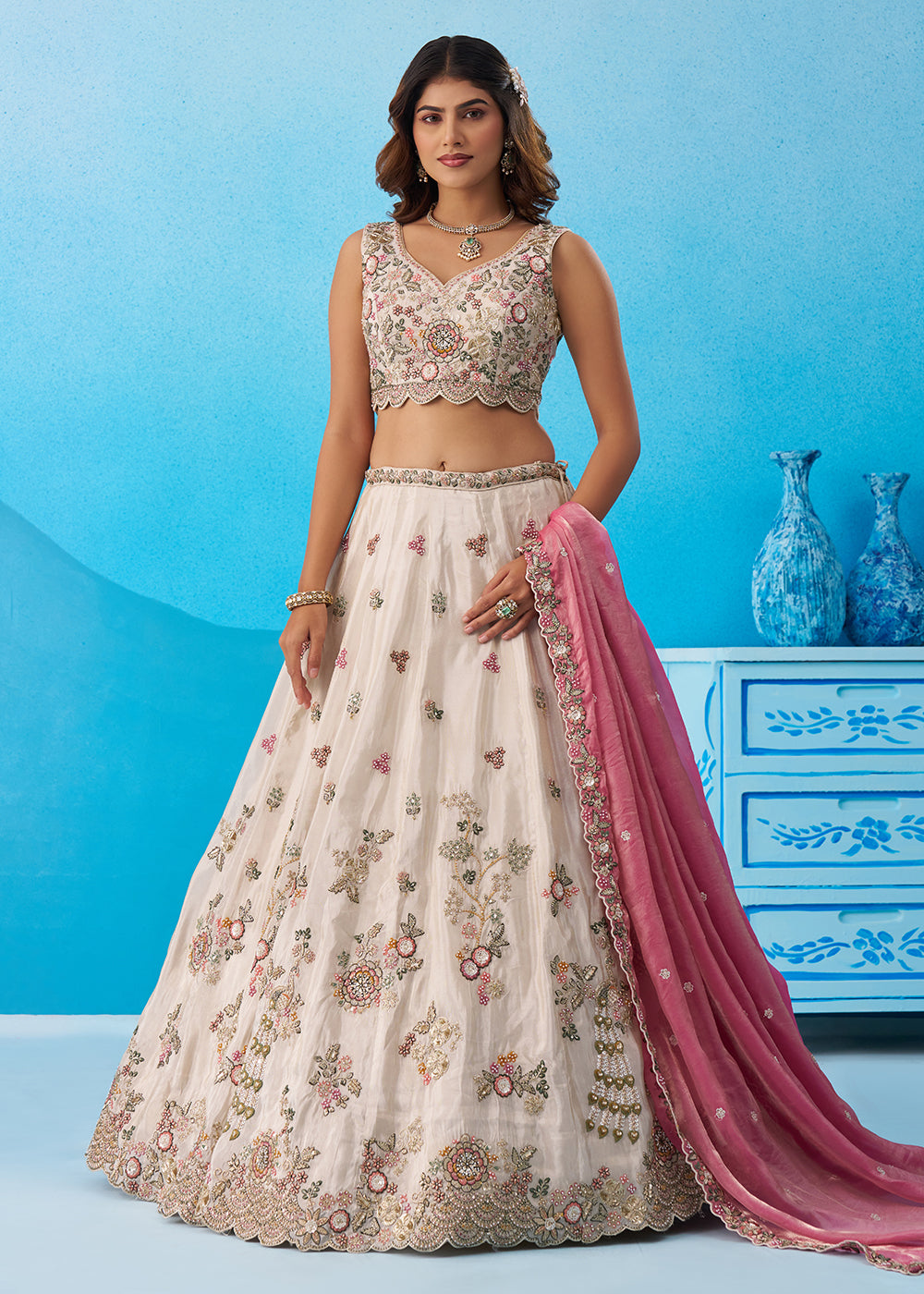 Buy Now Tissue Embroidered Cream Lehenga Choli with Pink Dupatta Online in US, UK, Canada, France, Italy, Germany, Australia, Greece, UAE & Worldwide at Empress.
