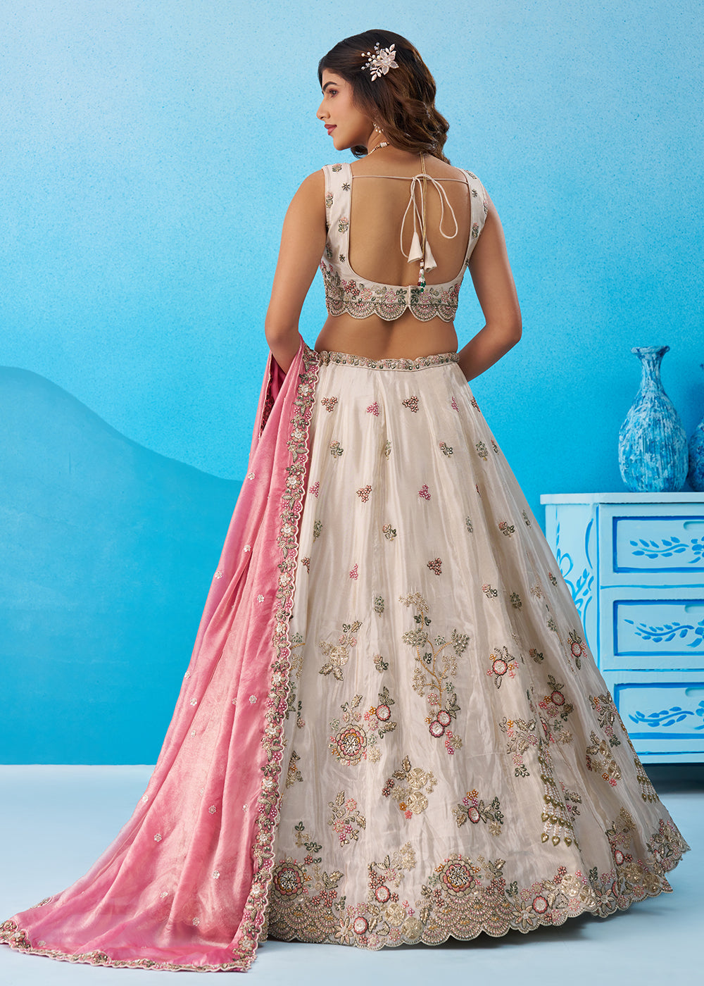 Buy Now Tissue Embroidered Cream Lehenga Choli with Pink Dupatta Online in US, UK, Canada, France, Italy, Germany, Australia, Greece, UAE & Worldwide at Empress.