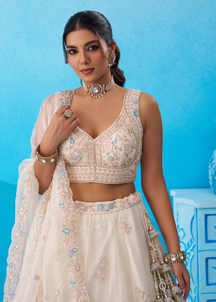 Buy Now Cream Floral Embroidered Designer Reception Lehenga Choli Online in US, UK, Canada, France, Italy, Germany, Australia, Greece & Worldwide at Empress.