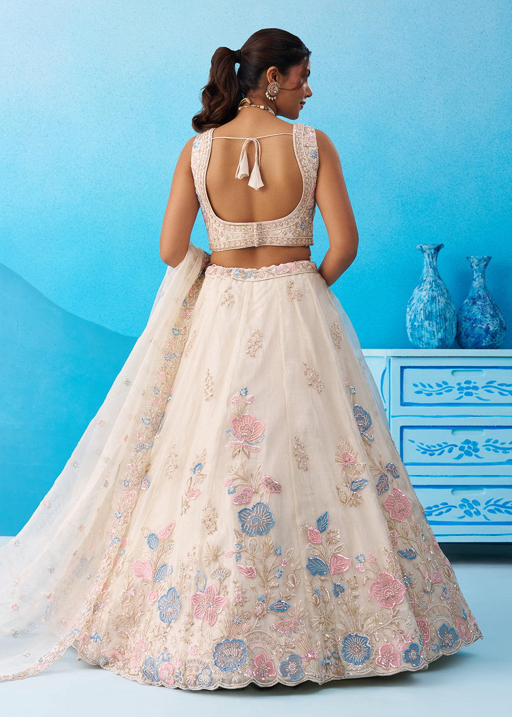 Buy Now Cream Floral Embroidered Designer Reception Lehenga Choli Online in US, UK, Canada, France, Italy, Germany, Australia, Greece & Worldwide at Empress.