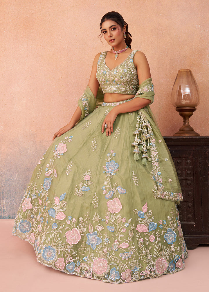 Buy Now Green Floral Embroidered Designer Reception Lehenga Choli Online in US, UK, Canada, France, Italy, Germany, Australia, Greece & Worldwide at Empress.