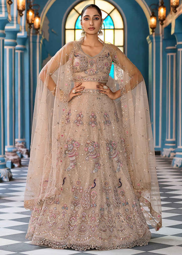 Buy Now Attractive Beige Net Embroidered Wedding Lehenga Choli Online in US, UK, Canada, France, Germany, Sweden, Greece, UAE, Denmark & Worldwide at Empress.